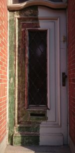 I started removing paint from the front door. It's a mess!