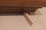 Old houses, uneven floors. I stacked popsicle sticks until the vanity was level.